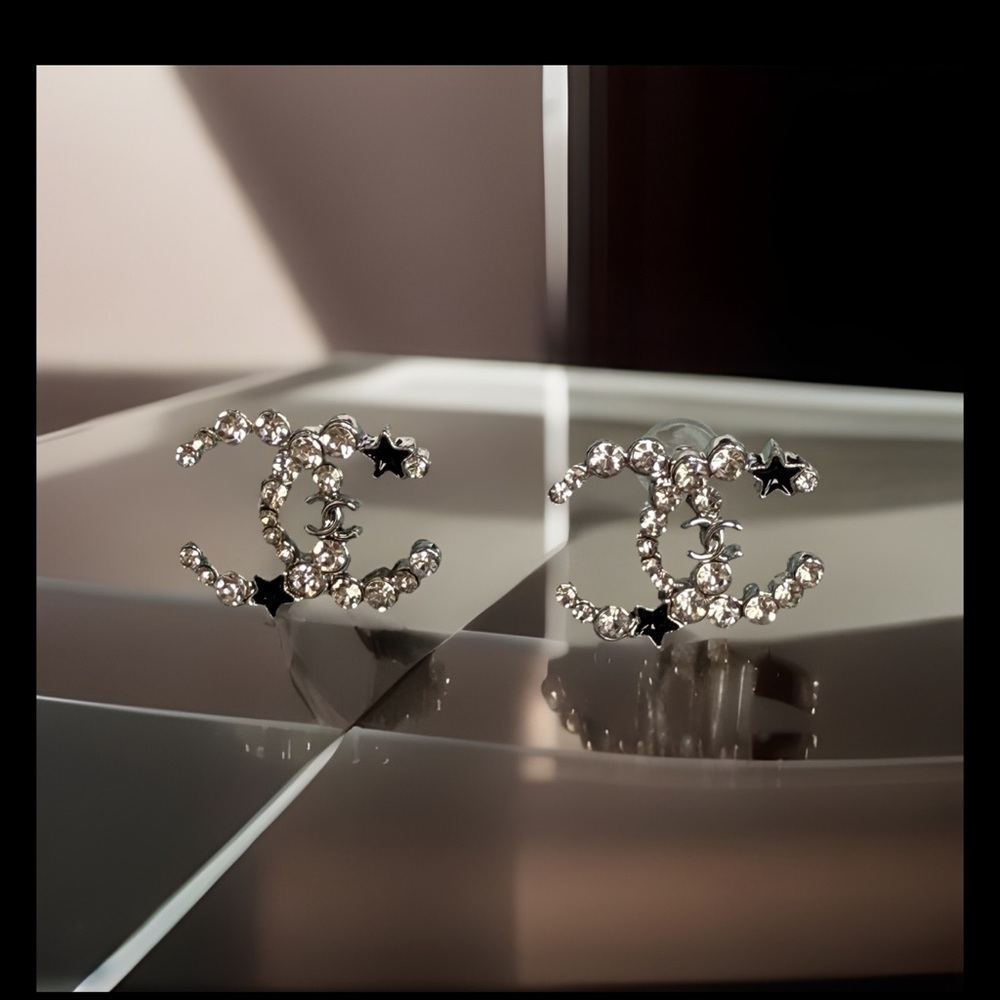 Crystal Logo Stud Earrings with Black Star Accent - Silver